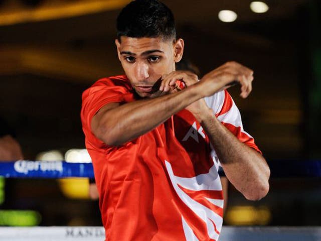 Amir Khan has been defeated three times as a pro boxer but hopes for a fresh start with new trainer Virgil Hunter 