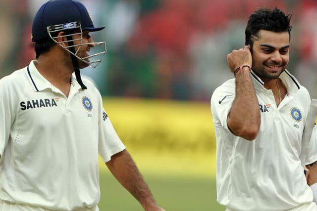 Virat Kohli (right) and captain Mahendra Singh Dhoni - playing in September