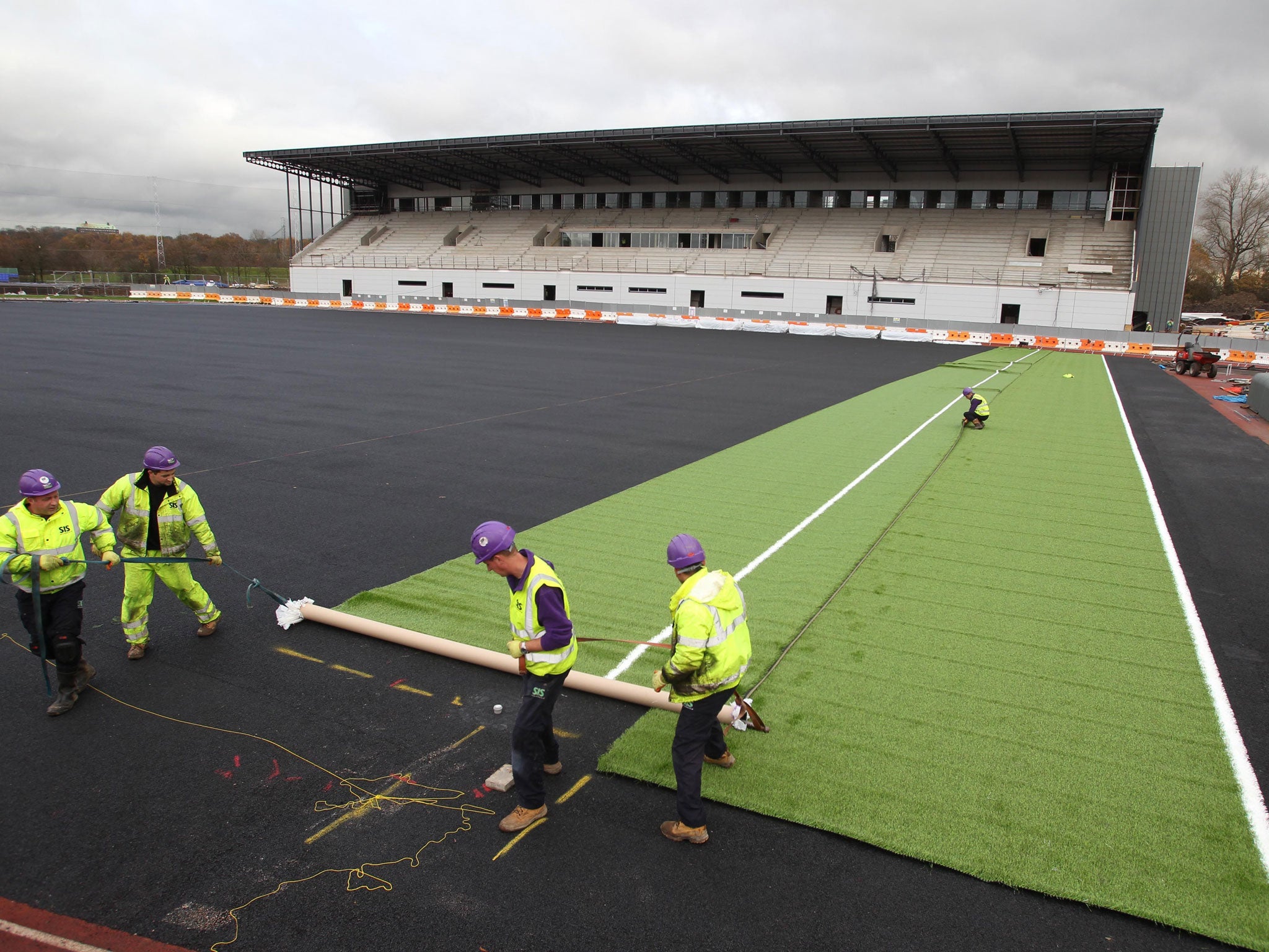Rugby’s rug: The synthetic pitch is laid at Saracens’ new home, Allianz Park