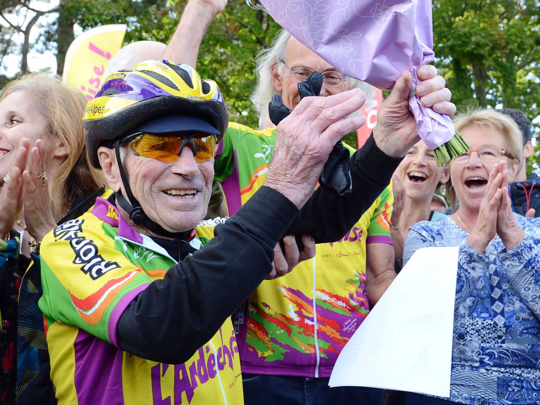 Robert Marchand celebrates his 100km cycling record for a centenarian