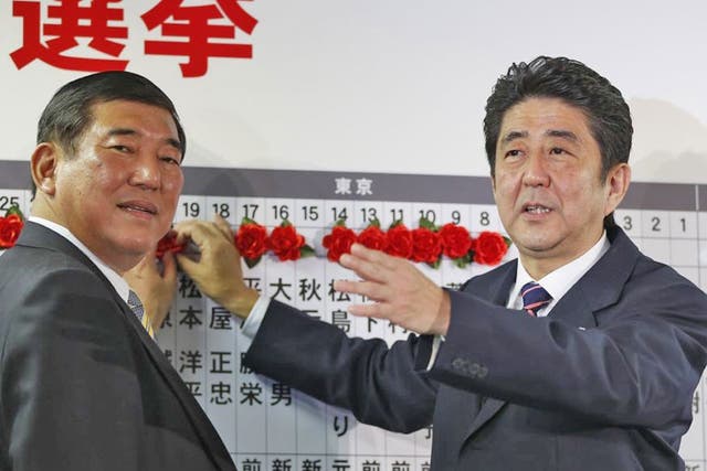 The LDP leader, Shinzo Abe, right, with the party’s secretary general Shigeru Ishiba