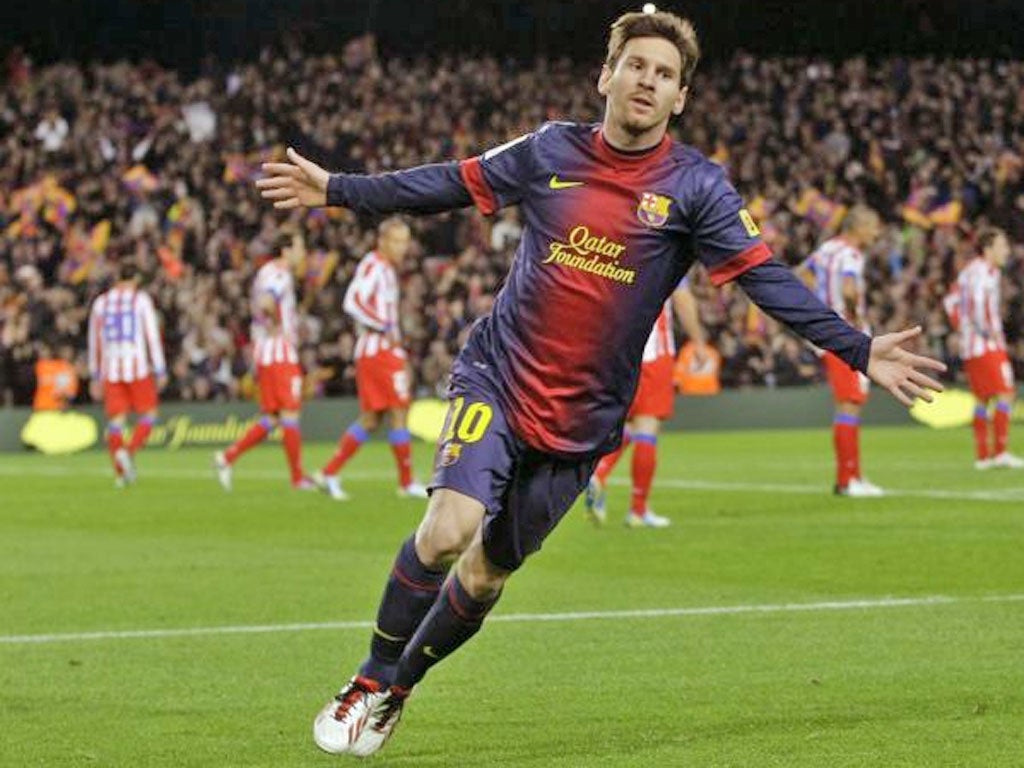 Lionel Messi celebrates scoring Barça’s third