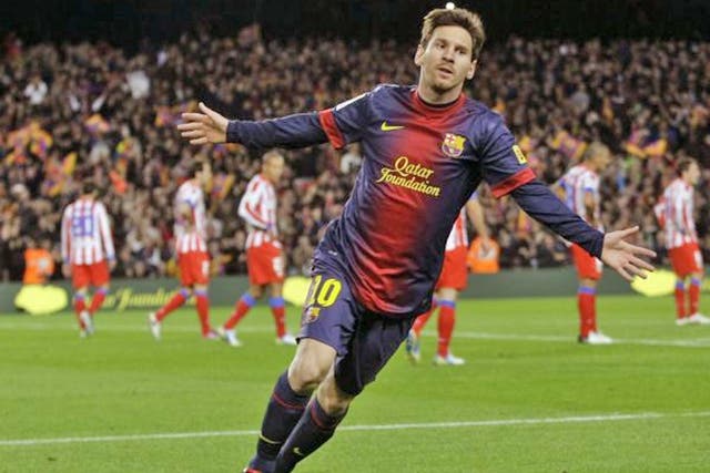 Lionel Messi celebrates scoring Barça’s third