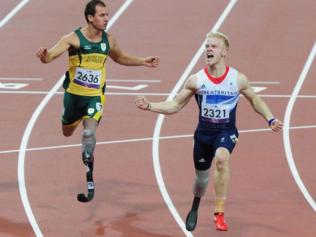 World record holder Jonnie Peacock wins the Paralympic T44 100m at the Olympic Stadium in London