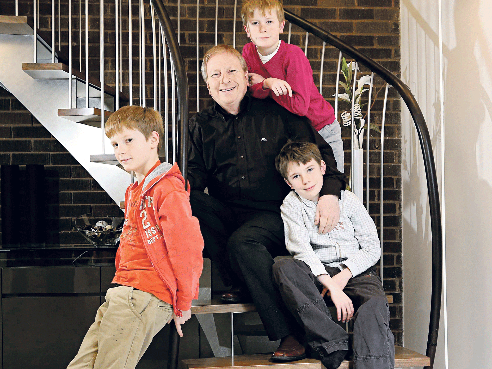 All boys together: Ian Mucklejohn with sons (L to R) Lars, Ian and Piers