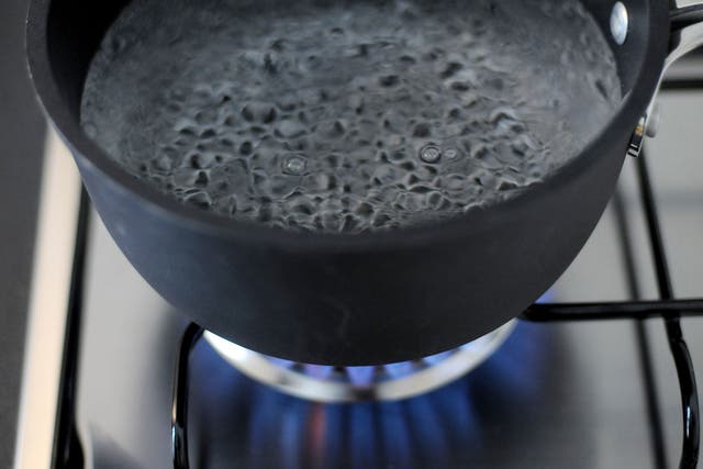 In this photo illustration water comes to the boil on a gas stove on January 8. 2009, in Milan, Italy.