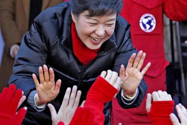 Park Geun-hye greets supporters at an election rally