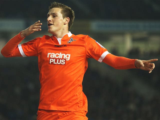 Millwall’s Chris Wood celebrates after scoring the first of his two goals