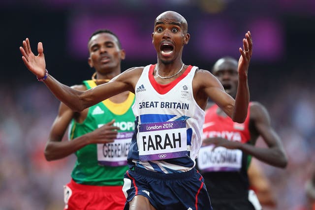 Mo Farah crossing the finishing line to win gold in the 5,000m final