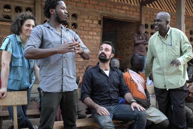 UNICEF Ambassador Ishmael Beah and Evgeny Lebedev speak to children who have been rescued by UNICEF from armed groups and are now receiving support at a transit centre in Bria where they can reclaim their childhoods and rebuild their lives