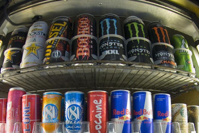 Cans of energy drinks are displayed in a store in California. The kick from caffeine has a growing number of consumers jumping into energy drinks-soft drinks spiked with nutritional aids and stimulants despite warnings from health professionals. 
