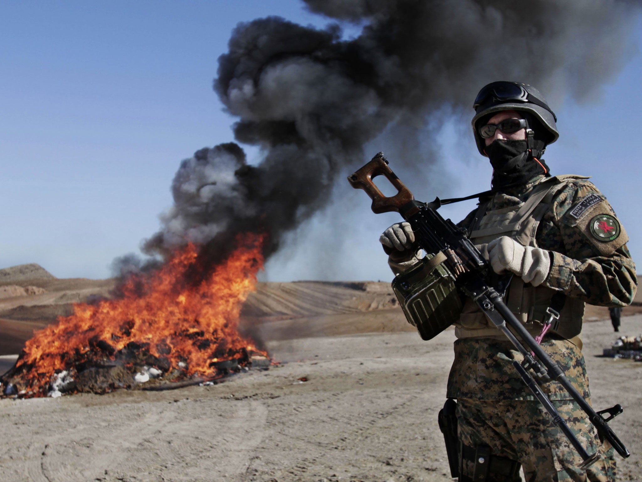 Confiscated drugs and alcohol set alight by Afghan security forces