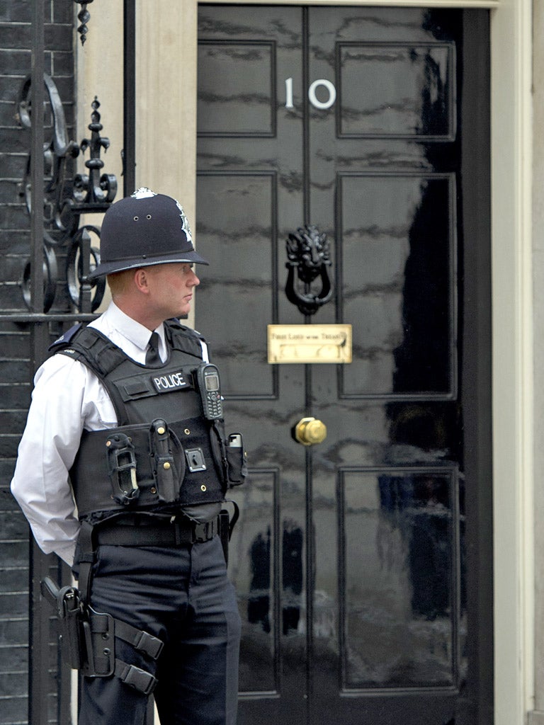 A police officer stands outside Number 10 Downing Street
