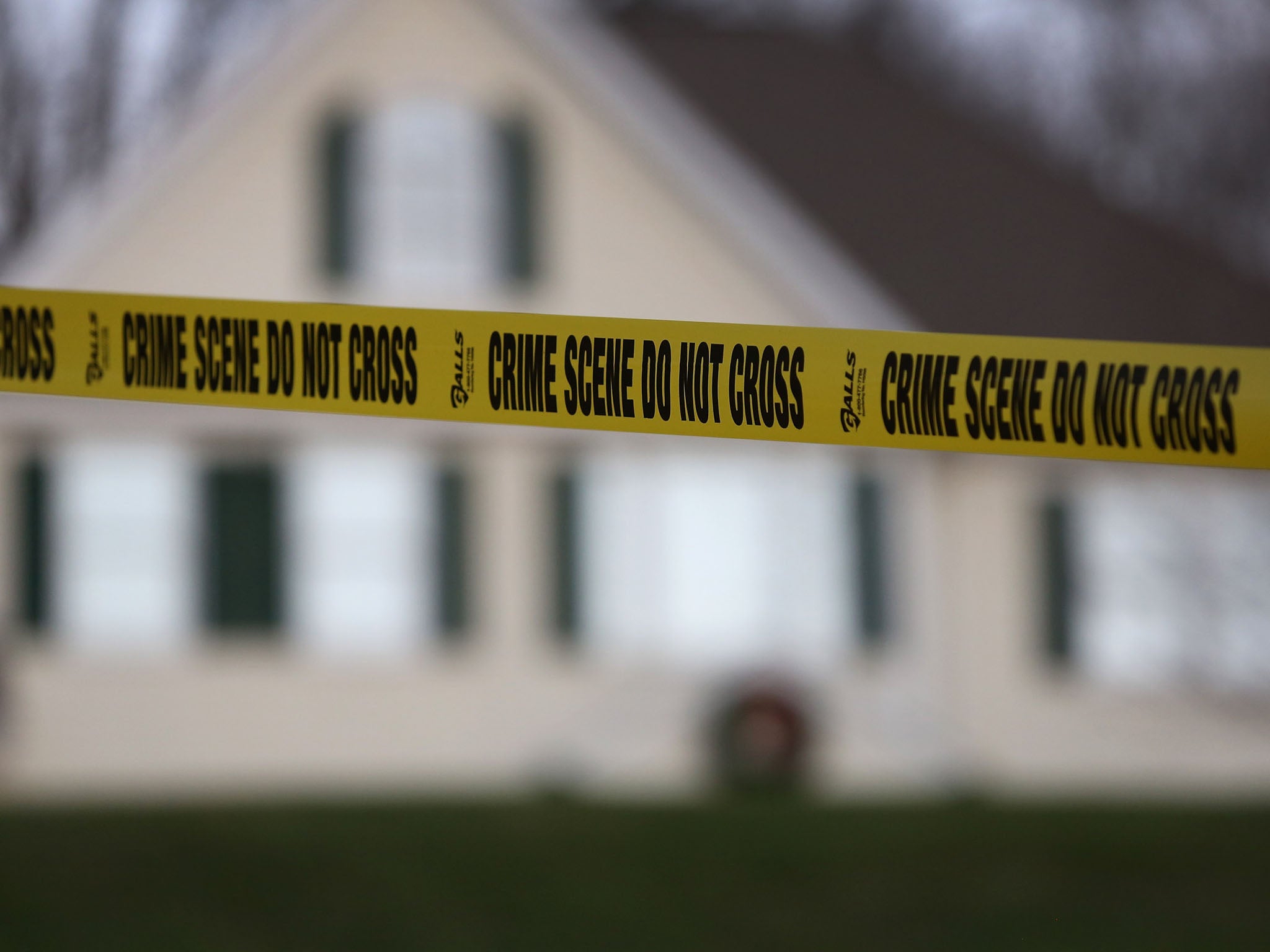 Police tape outside the home of Nancy Lanza