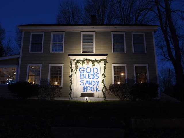 A banner on a home in Newtown, Connecticut