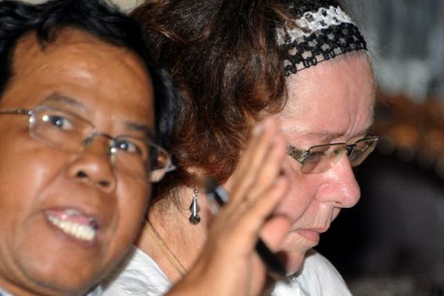 Sandiford (right) of Britain with her interpreter during the trial on the Indonesian resort island of Bali