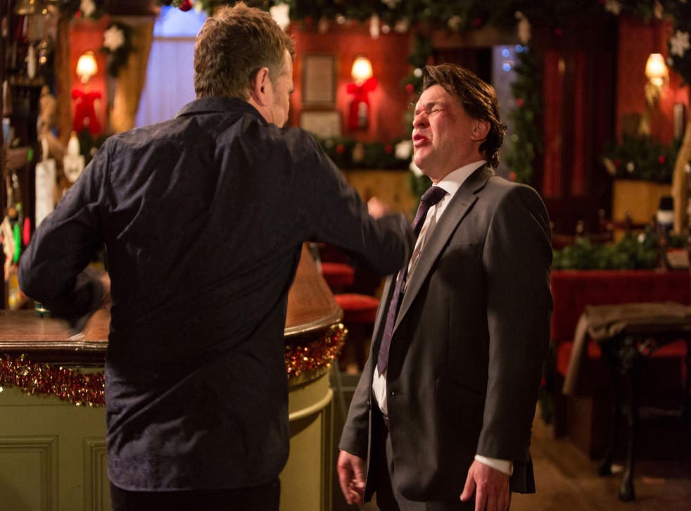 Alfie Moon, played by Shane Richie and Derek Branning, played by Jamie Forman. Alfie loses his cool and lashes out at Derek after he discovers the truth about long-held suspicions his wife Kat was having an affair.