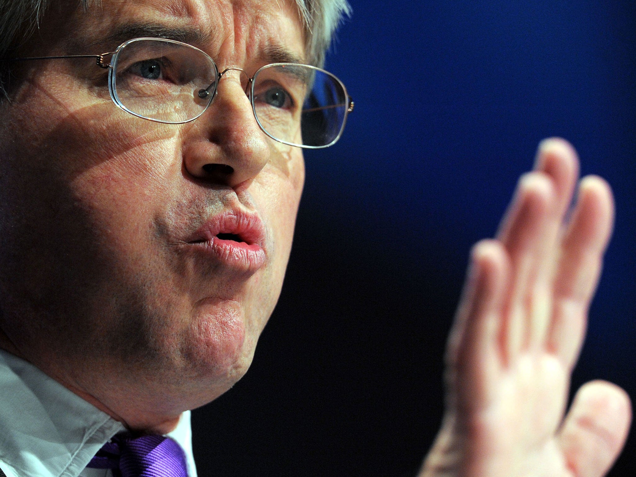 Andrew Mitchell speaks during the final day of the Conservative Party Conference in Manchester on October 8, 2009.