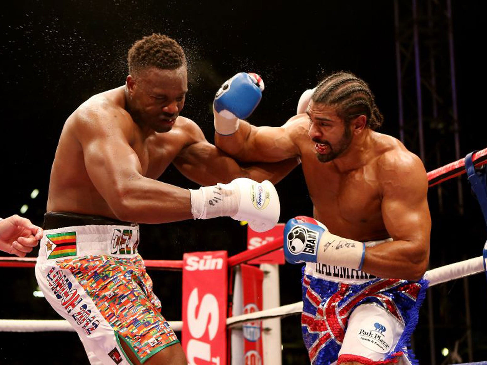 David Haye (right) has Dereck Chisora in trouble at Upton Park