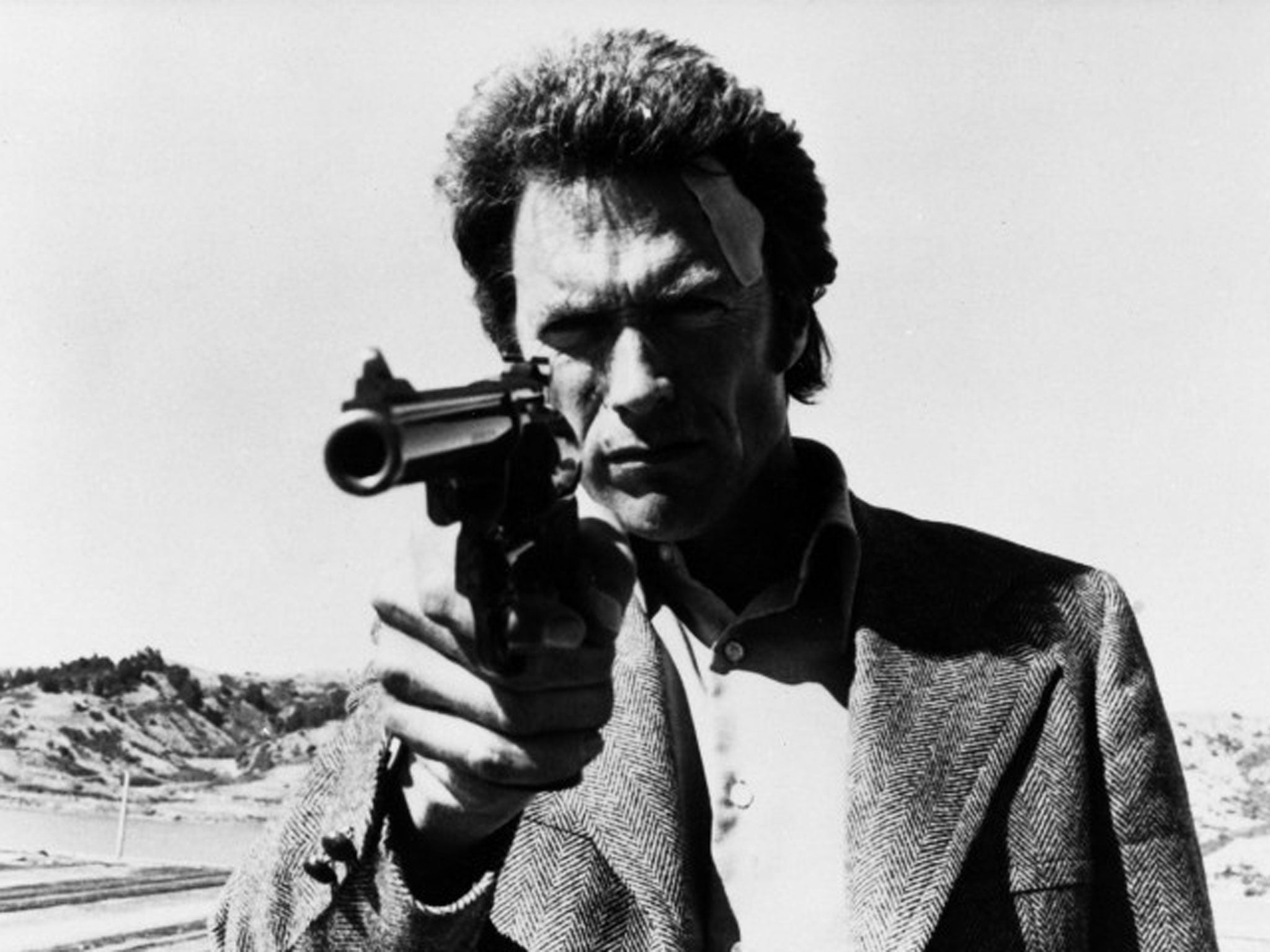 Clint Eastwood with handgun in his Dirty Harry role