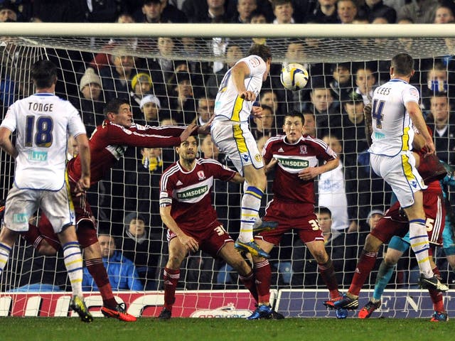 On the rise: Luciano Becchio nods in Leeds’ second to hit the club’s top 10
