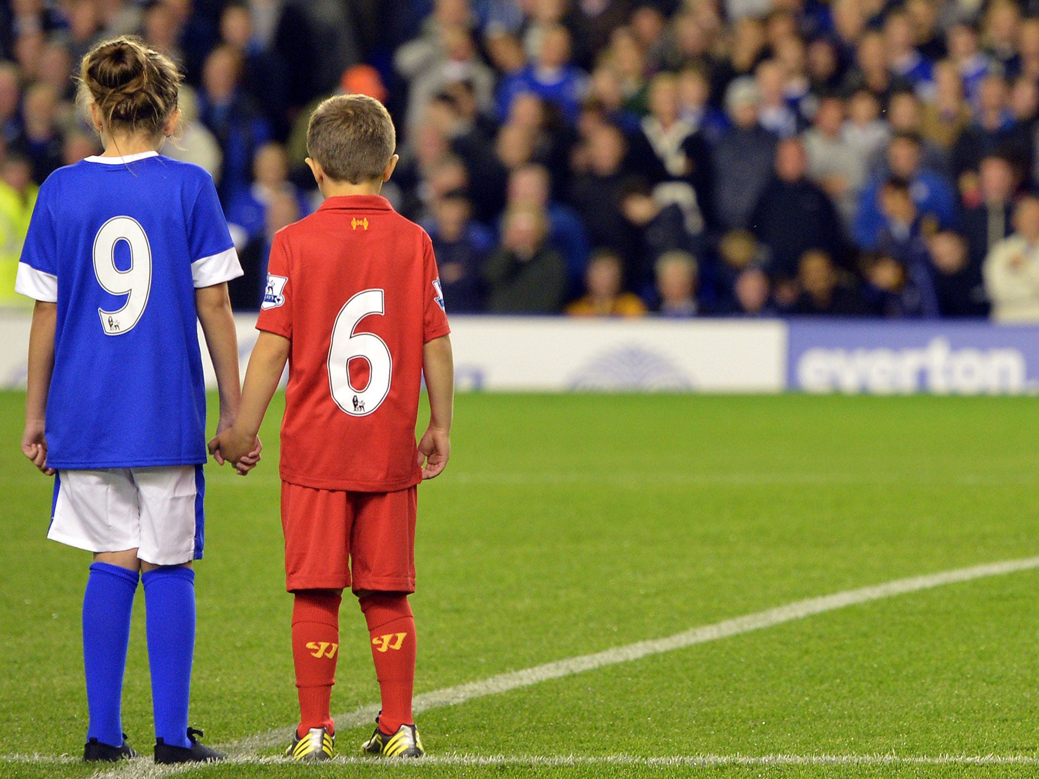 Show of hands: The Everton-Liverpool tribute to the 96 created the most striking football image of the year