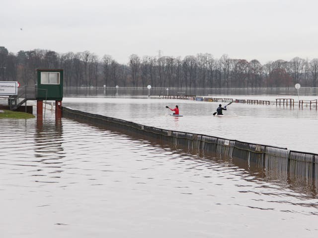Kayakers on flooded Worcester race course