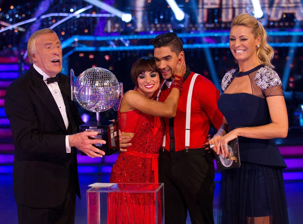 Bruce Forsyth and Tess Daly flanking 'Strictly' winners Flavia Cacace and Louis Smith