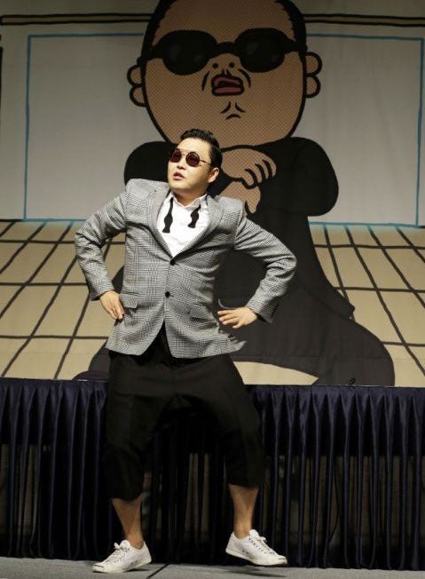 Which single by South Korean singer PSY had racked up more than 760 million hits on YouTube by November 2012, making it one of the most watched music videos of all time?