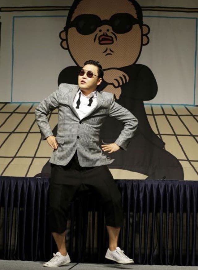 Which single by South Korean singer  PSY had racked up more than 760 million hits on YouTube by November 2012, making it one of the most watched music videos of all time?
