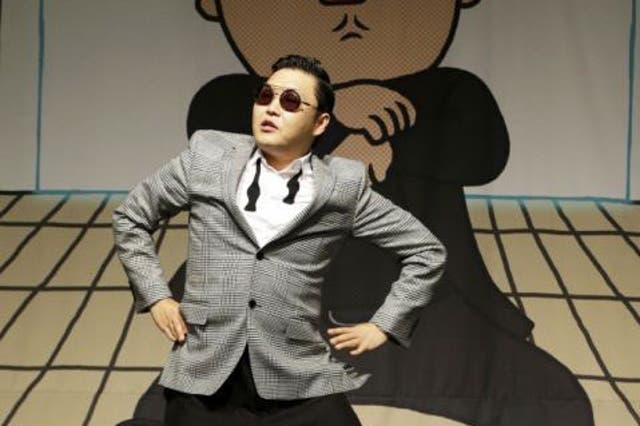 Which single by South Korean singer  PSY had racked up more than 760 million hits on YouTube by November 2012, making it one of the most watched music videos of all time?