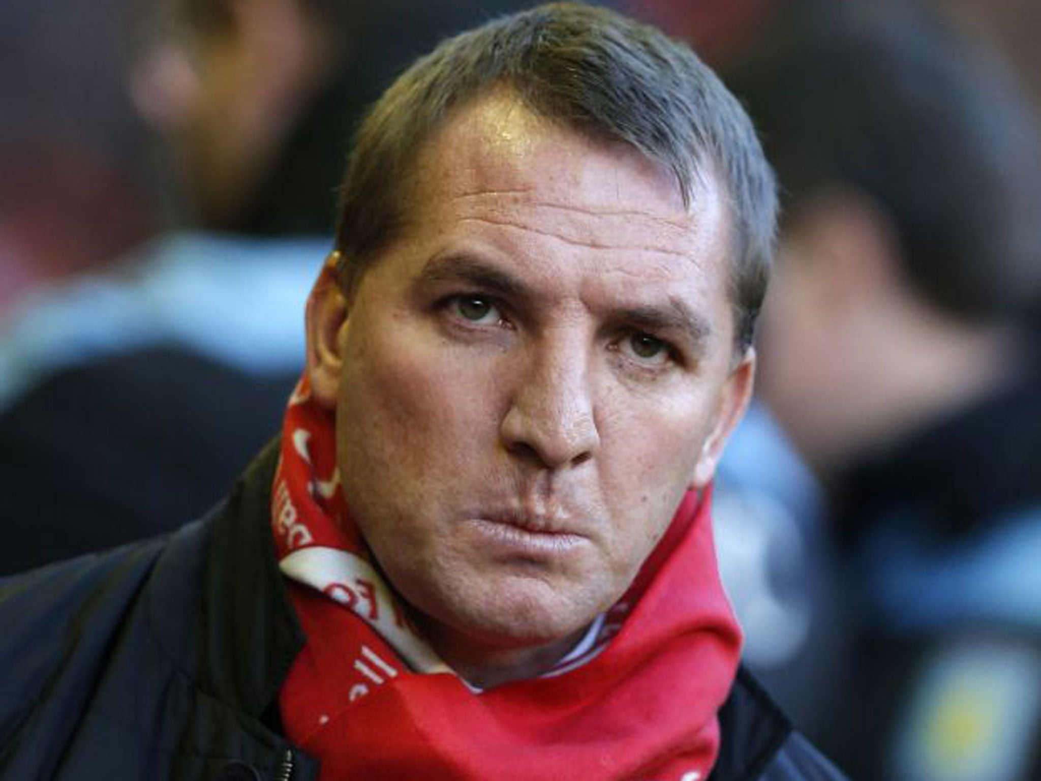 Brendan Rodgers sports a Liverpool scarf against Aston Villa