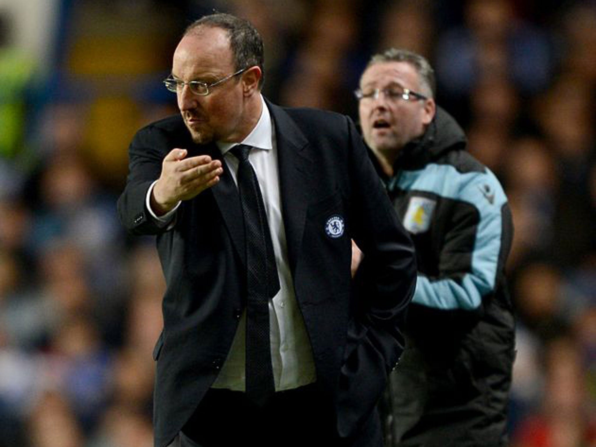 Rafa Benitez (left) and his Villa rival Paul Lambert shout instructions