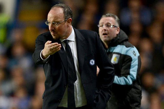 Rafa Benitez (left) and his Villa rival Paul Lambert shout instructions
