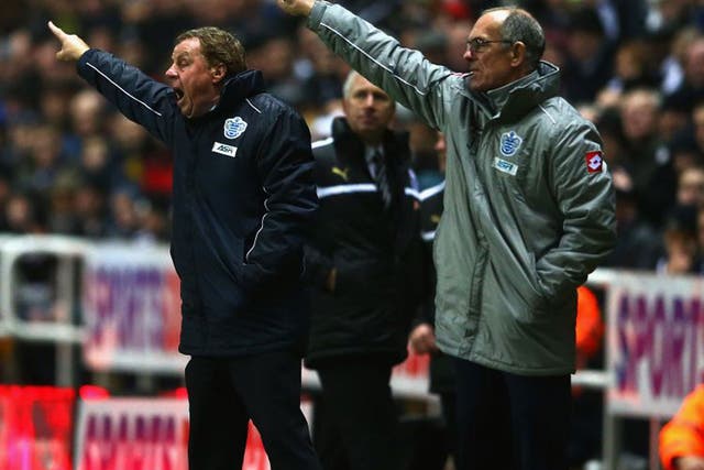 Harry Redknapp and his coach Joe Jordan point the way to their QPR players