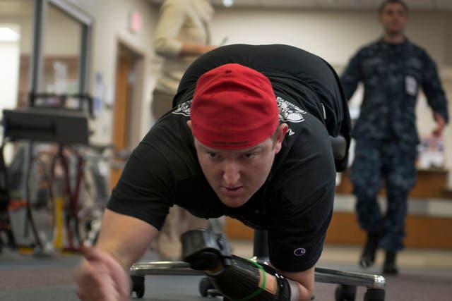 Sergeant Monte Bernardo exercising his upper body at the Walter Reed National Military Medical Center