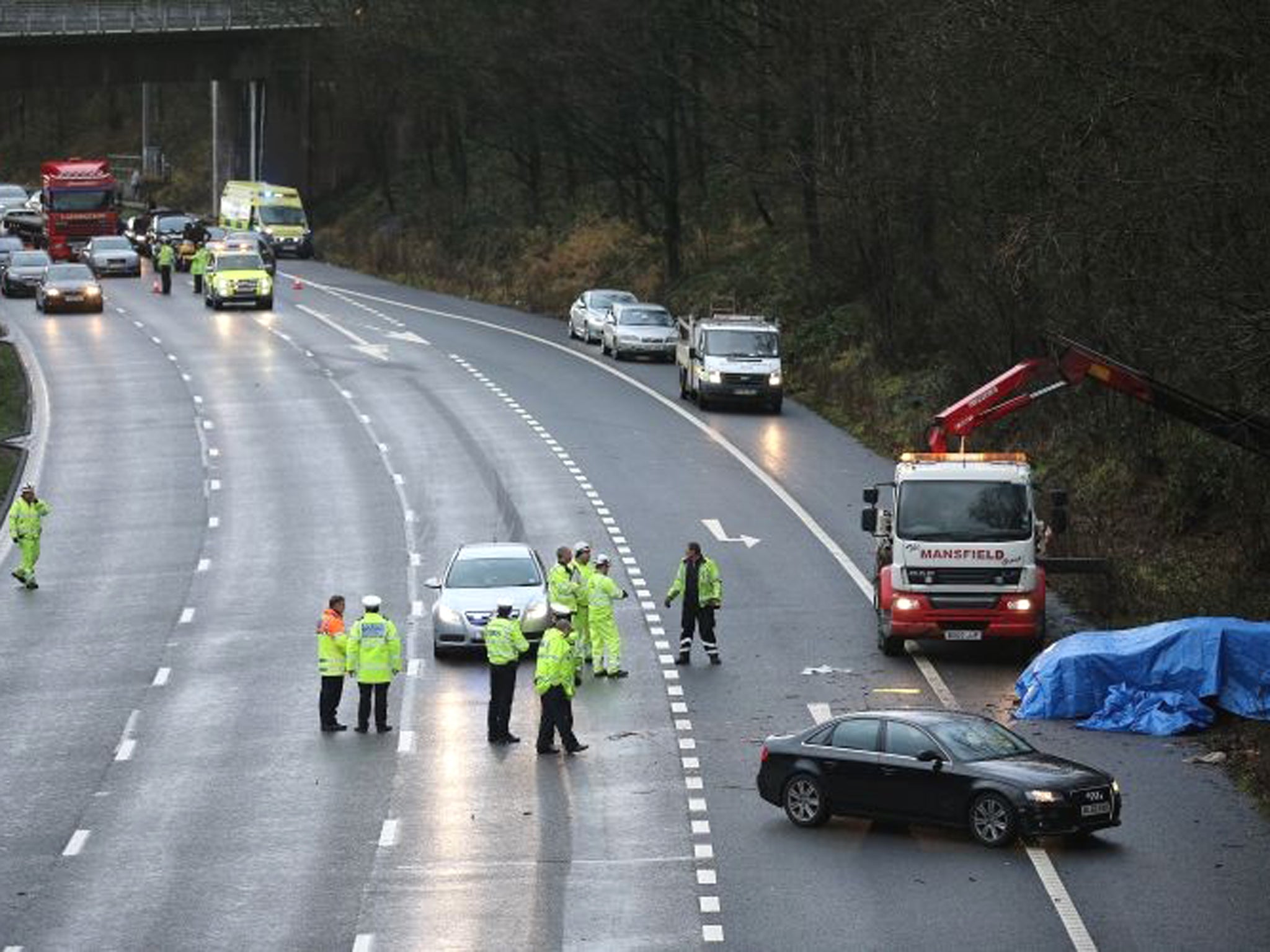 Police and emergency services attend the aftermath of a serious motor accident between Junctions 14 and 15 on the M6 motorway