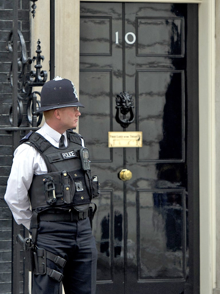 A police officer stands outside Number 10 Downing Street
