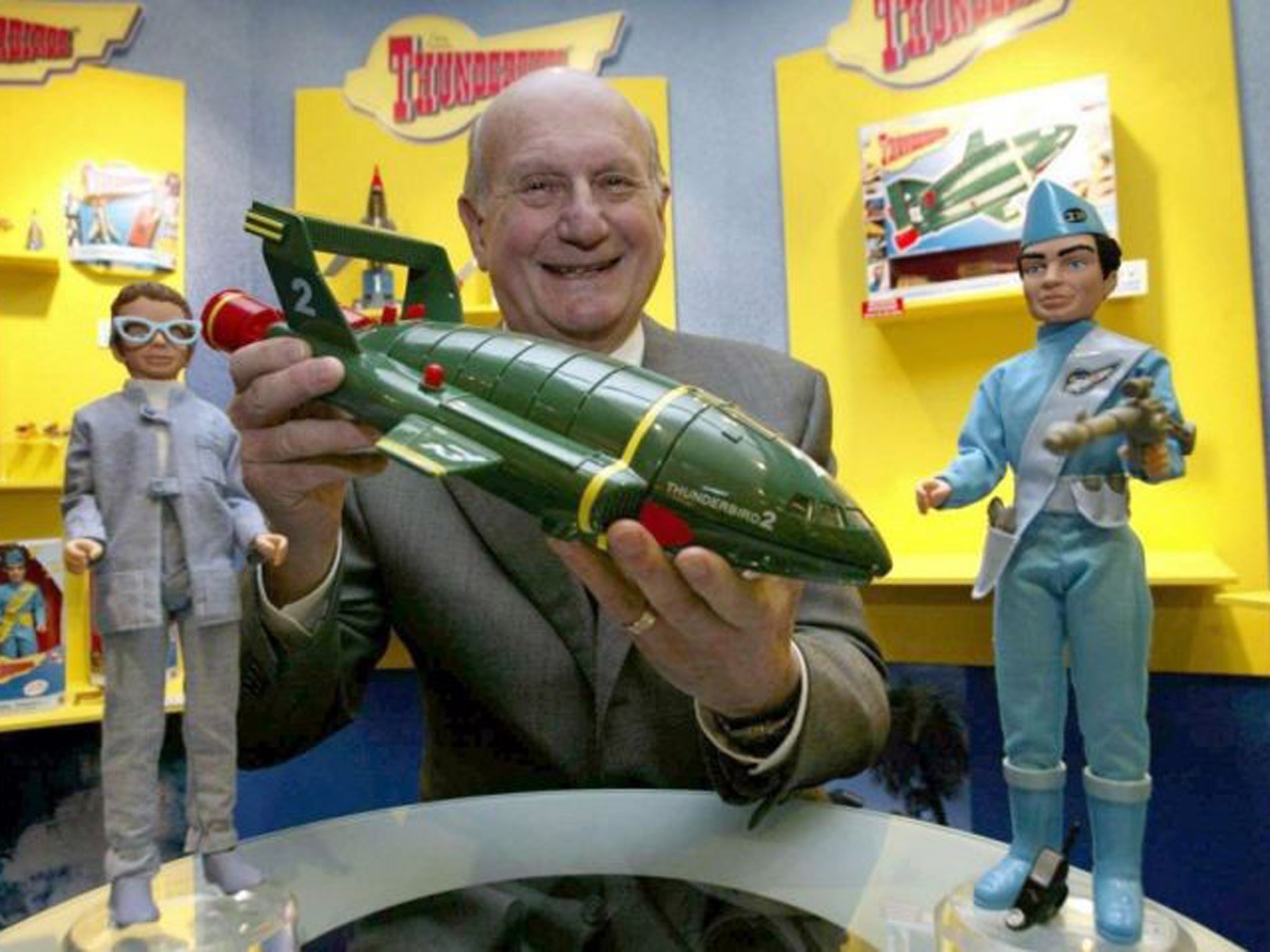 The creator of Thunderbirds, Gerry Anderson holds Thunderbird 2 on the 40th anniversary of the Thunderbirds in 2005
