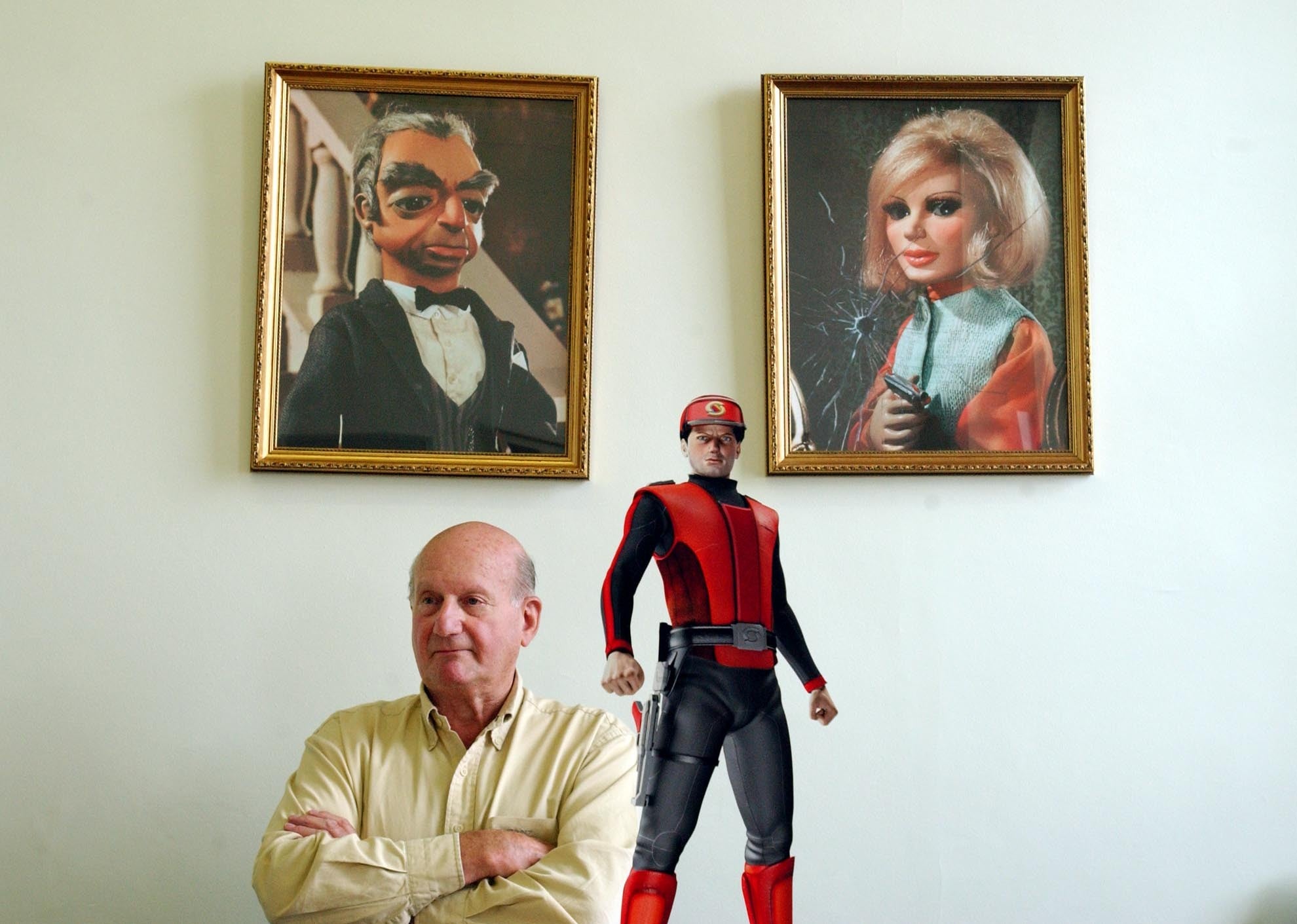 Anderson with three of his creations, Parker and Lady Penelope and, foreground, Captain Scarlet
