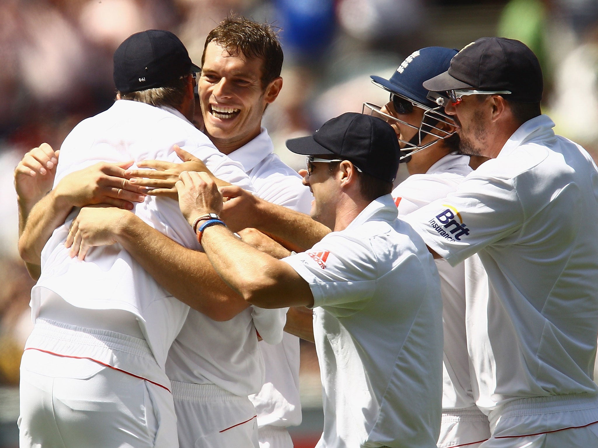 Chris Tremlett is congratulated after taking the key wicket of Ricky Ponting during the Boxing Day Test in 2010