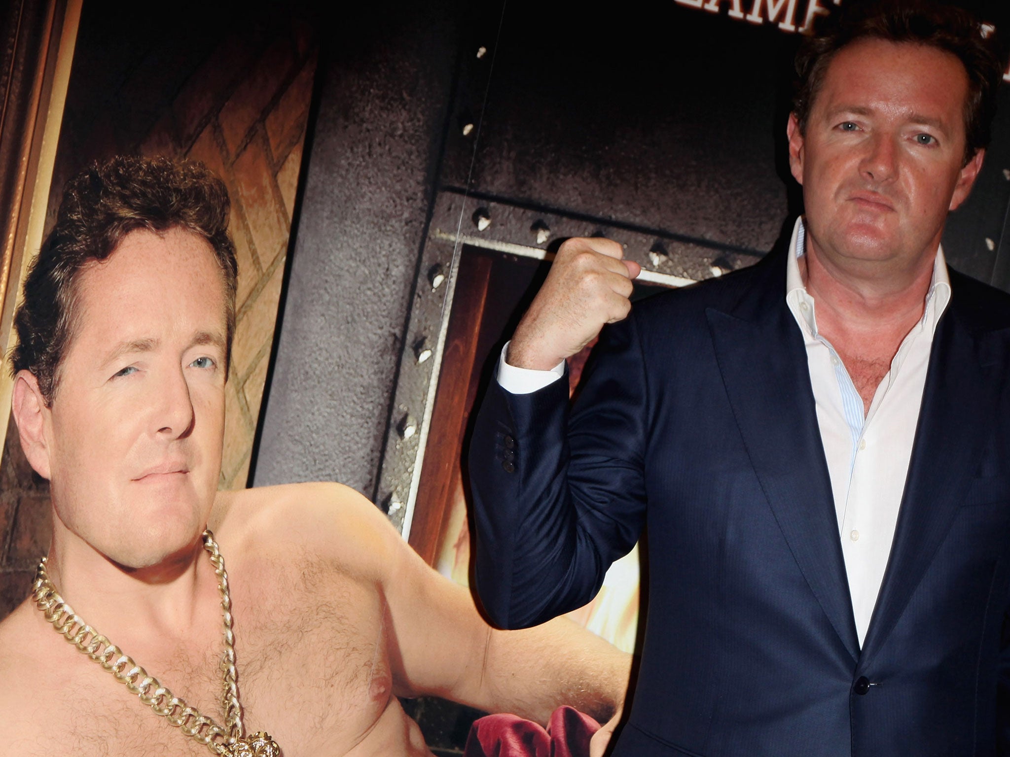 Piers Morgan attends a photocall for the new Burger King fragrance 'Flame' at Selfridges on June 15, 2009 in London, England.