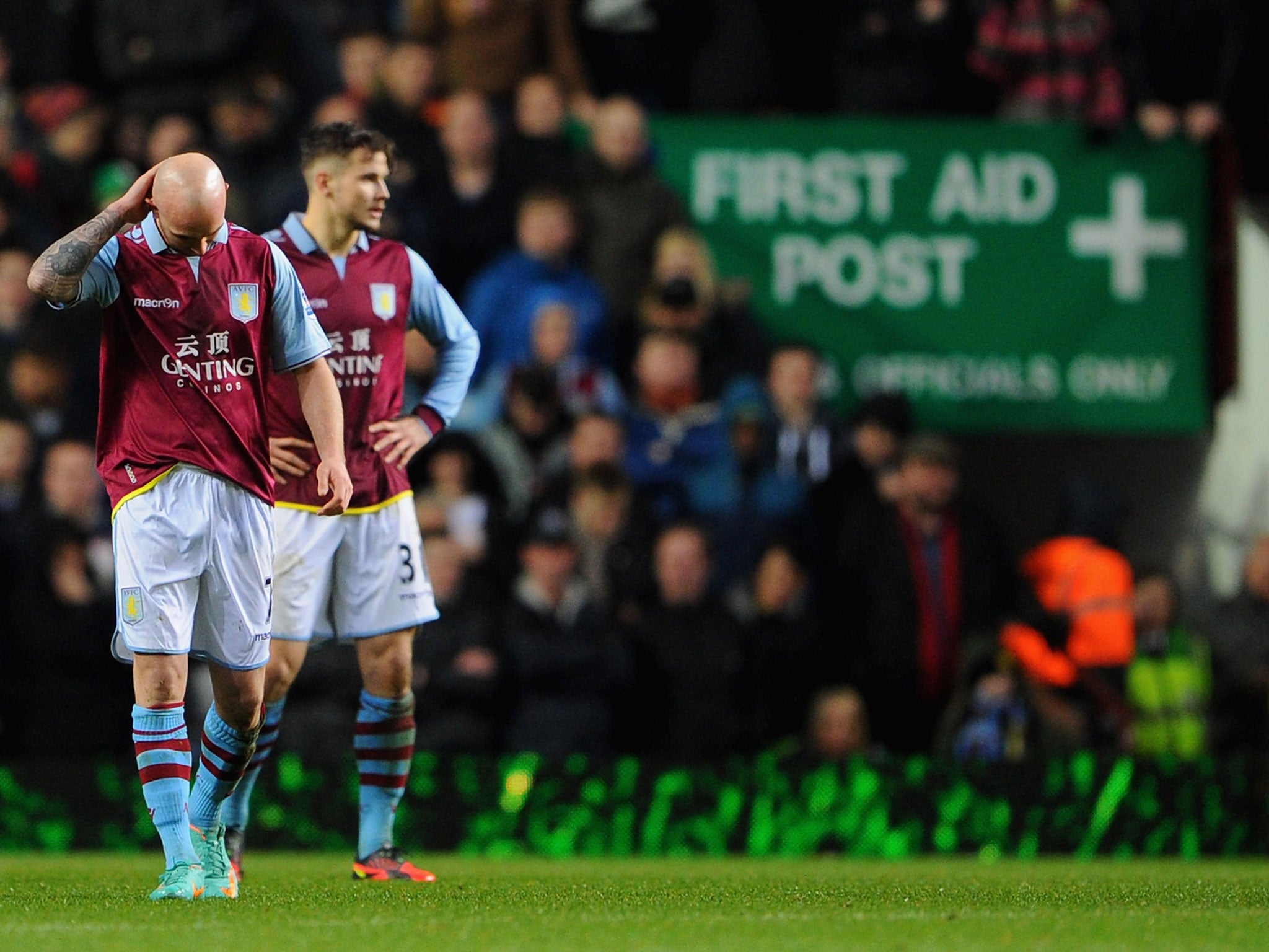 Stephen Ireland (left) and Chris Herd look on during their side's thumping by Wigan