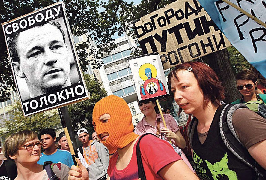 Under a bad sign: Pussy Riot sympathisers protest about the arrival of John Terry to play at Zenit St Petersburg