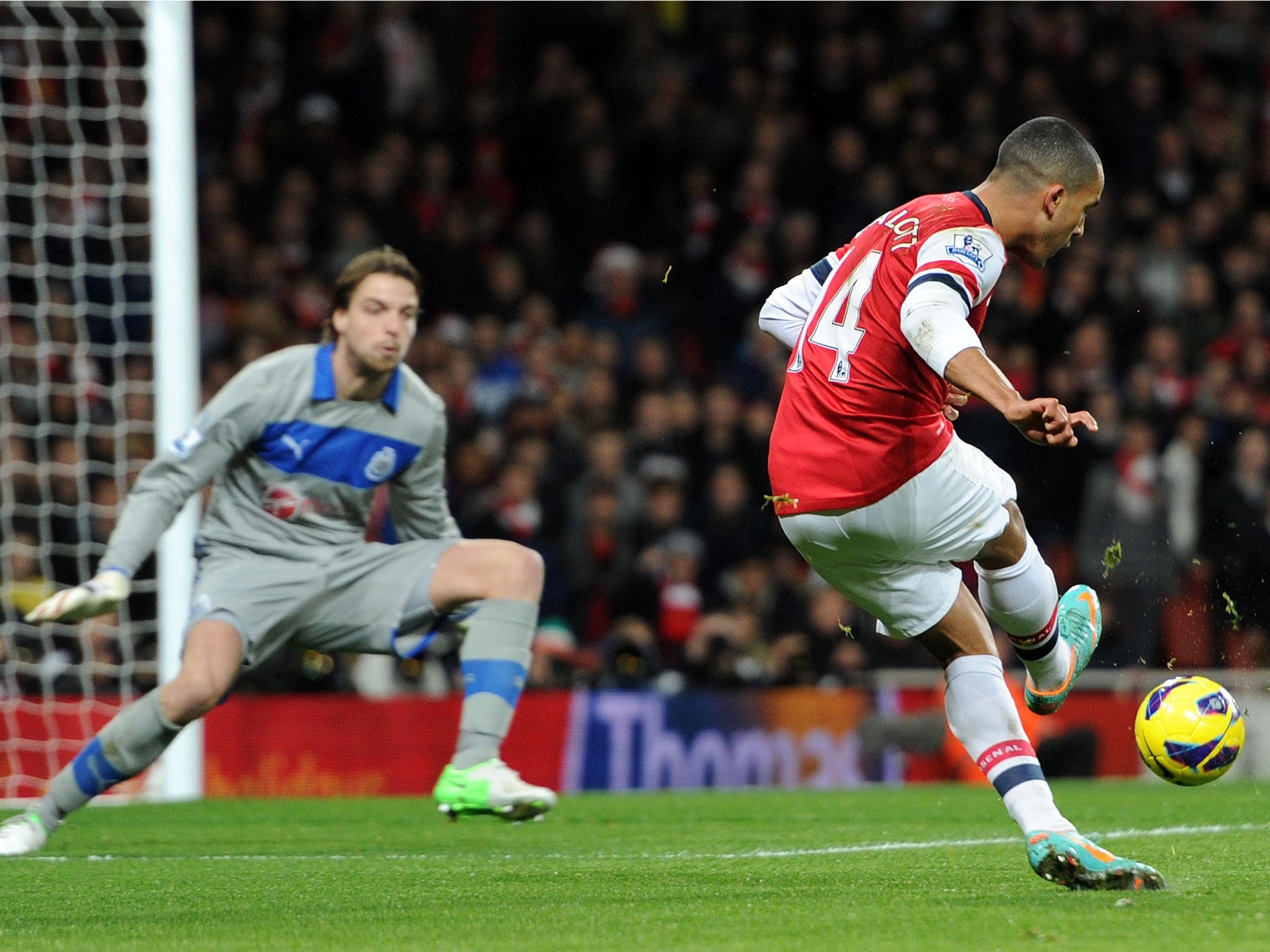 Theo Walcott scores the first of his three goals