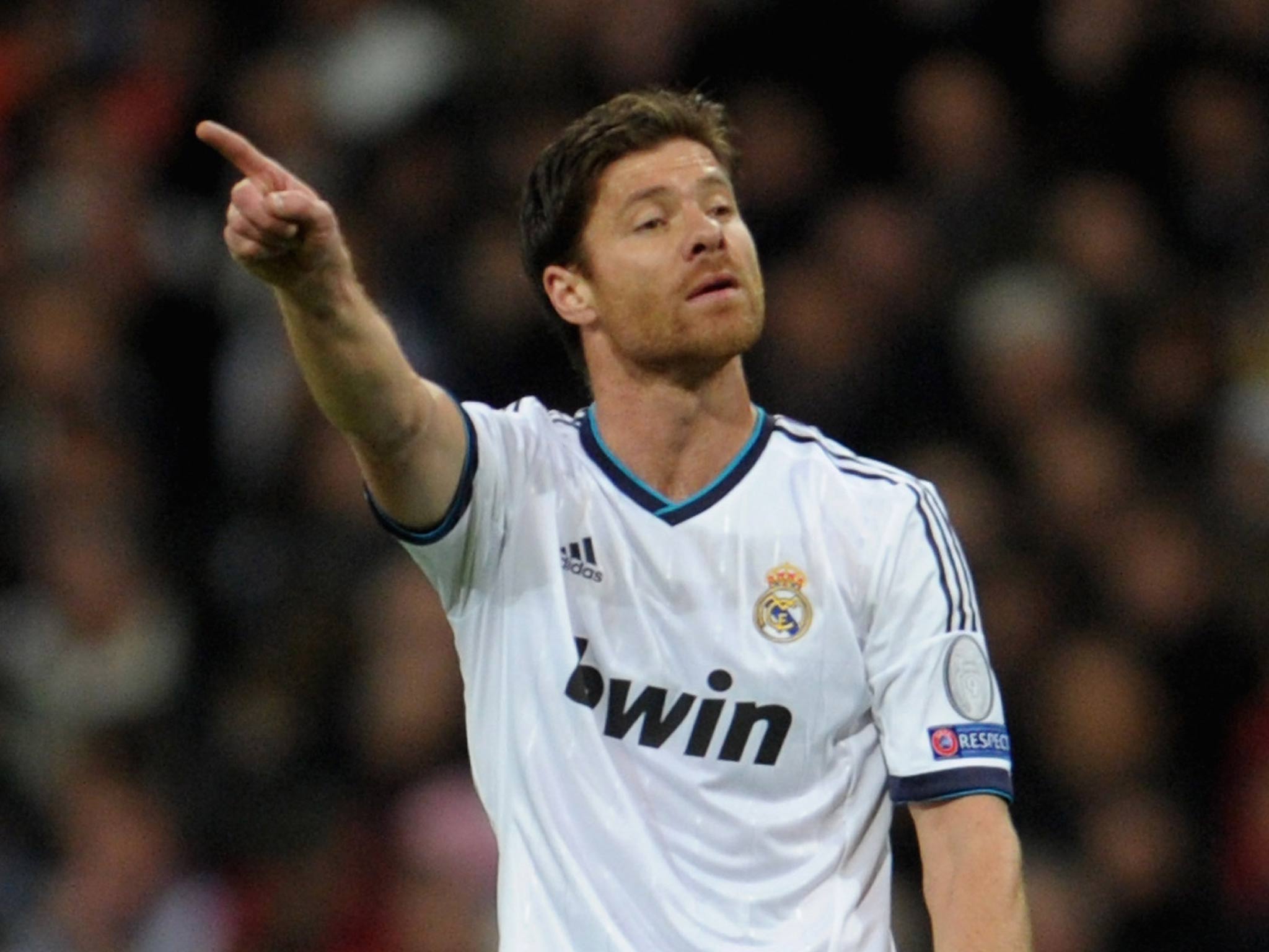 Real Madrid player Xabi Alonso plays down transfer speculation
