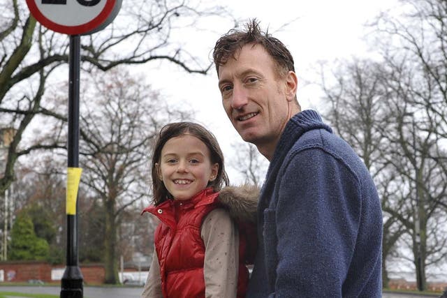Jonathan Brown with his daughter Olivia near their home in York