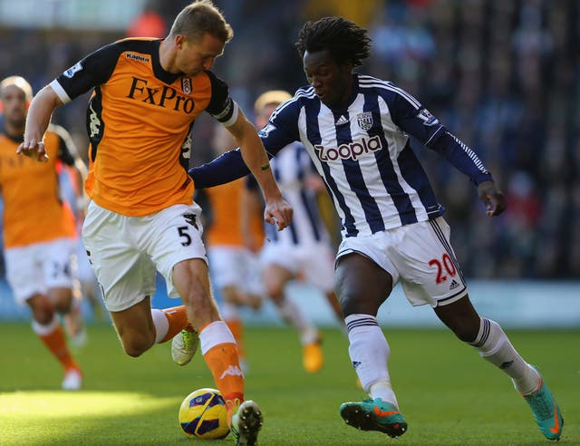 West Brom's goalscorer Romelu Lukaku takes on Fulham defender Brede Hangeland