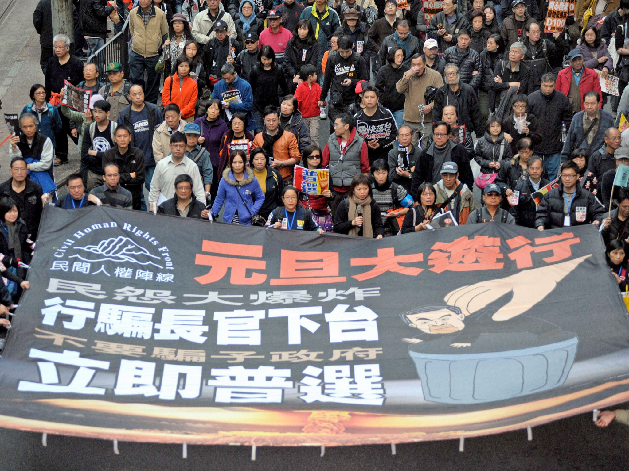 Thousands of protesters take to the streets calling for Leung Chun-ying to step down