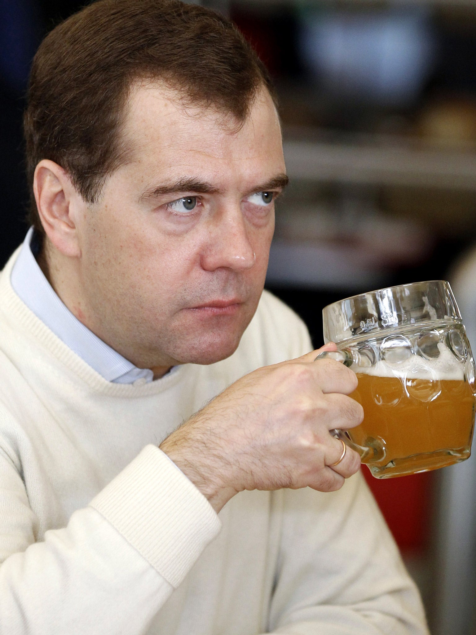 Former Russian President, Dmitry Medvedev, with a beer